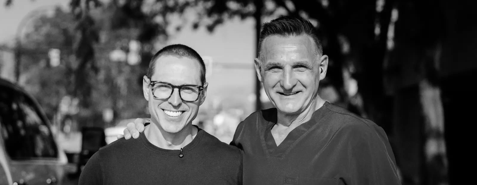 Dr. Michael Webster and Dr. Mark Wasylyk outside Tandem Dental Studio.
